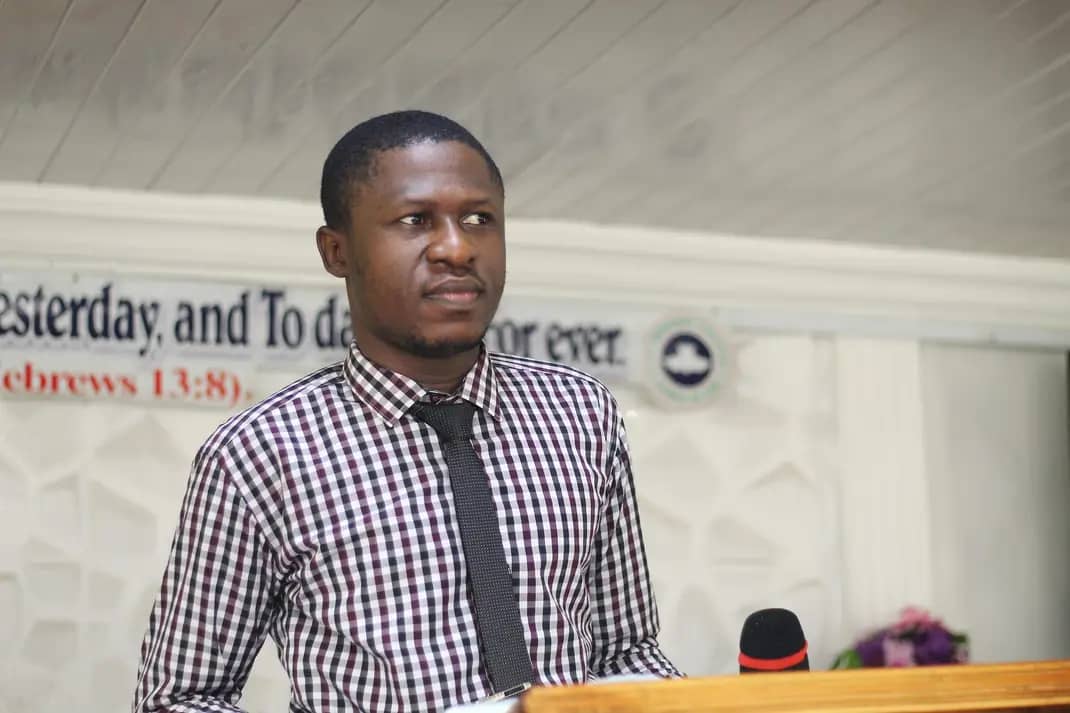 Ibukun Moshoba on a pulpit of RCCG Church